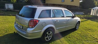 Astra caravan 1.6 16V - 7