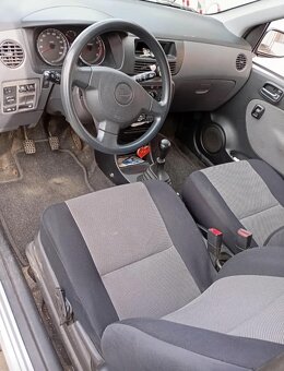 Daihatsu Cuore - 7