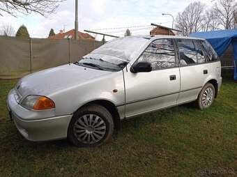 Suzuki Swift 1.3 50kw rok 99 - 7