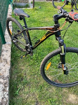 Pánské a dámské horské kolo - 7