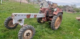 Prodám traktor RS-09 bez motoru - zánovní pneu - 7