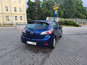 Mazda 3 1,6i - 7