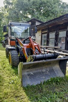 Kloubový nakladač 920T - 7