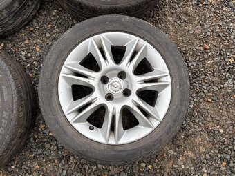 Alu orig letni sada Opel 4x100 6,5J ET40 195/55 R16 - 7