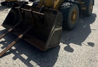 Na prodej: Kolový nakladač CAT 907M (2019) - 7