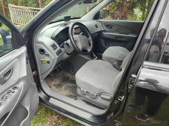 Hyundai Tucson 2.0i 104kw 4x4 - 7