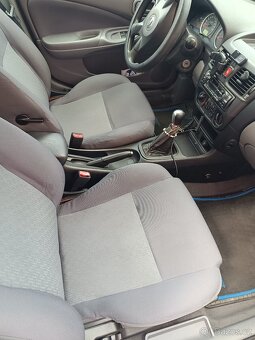 Nissan Almera 2003 - 7