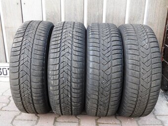 Komplet Zimní Sada Pirelli +Poklice205/60/16 ET 48 5X112 - 7