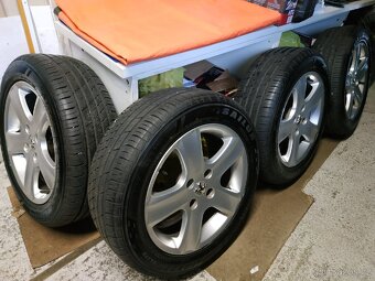 ALU kola Peugeot 4x108 r16 Originál, Zánovní pneu 8mm - 7