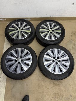 Prodám zimní pneu +alu - 7