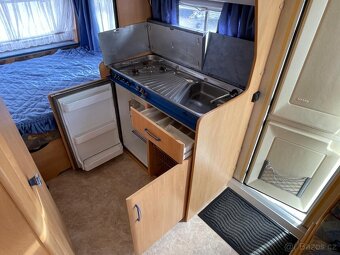 Hobby De luxe 450, 4 osoby, stan, pevná postel - 7