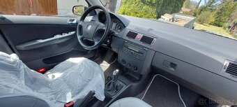 Škoda Fabia Edition 100 1.4 16 74KW v kůži prodám - 7