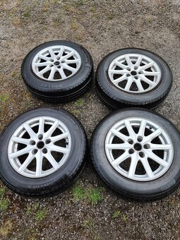 Prodám ALU kola rozteč 5x100 R15 ET 35 s letním pneu 195/65 - 7