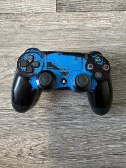 Playstation 4 slim (1 TB) - 7