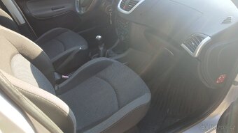 Peugeot 206+ 1,4i - 7