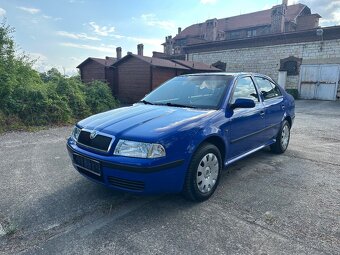 Škoda Octavia 1,6i 75kw výbava TOUR - 7