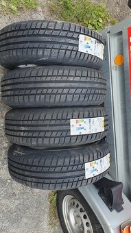 Letní Alu kola+zimní pneu Berlingo,Partner - 7
