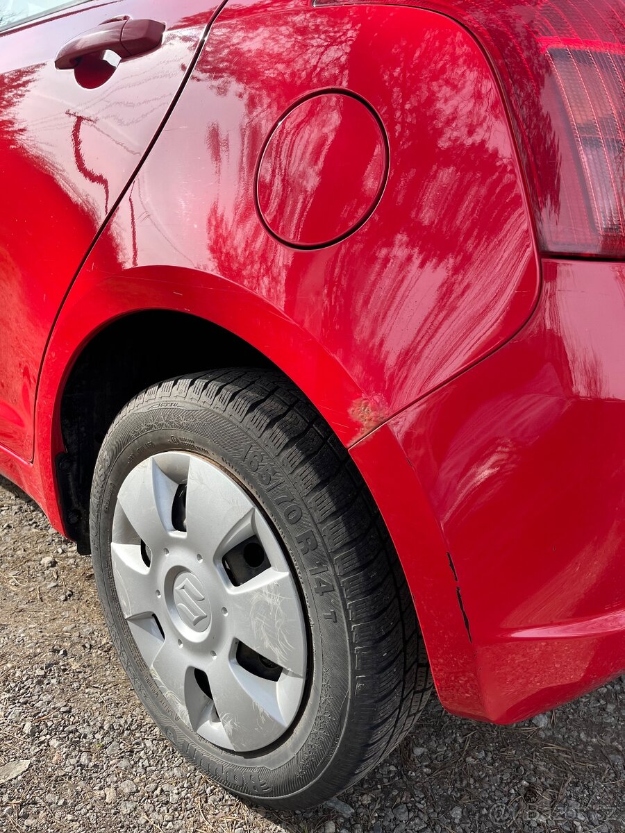 Suzuki Swift 1.3 - 8