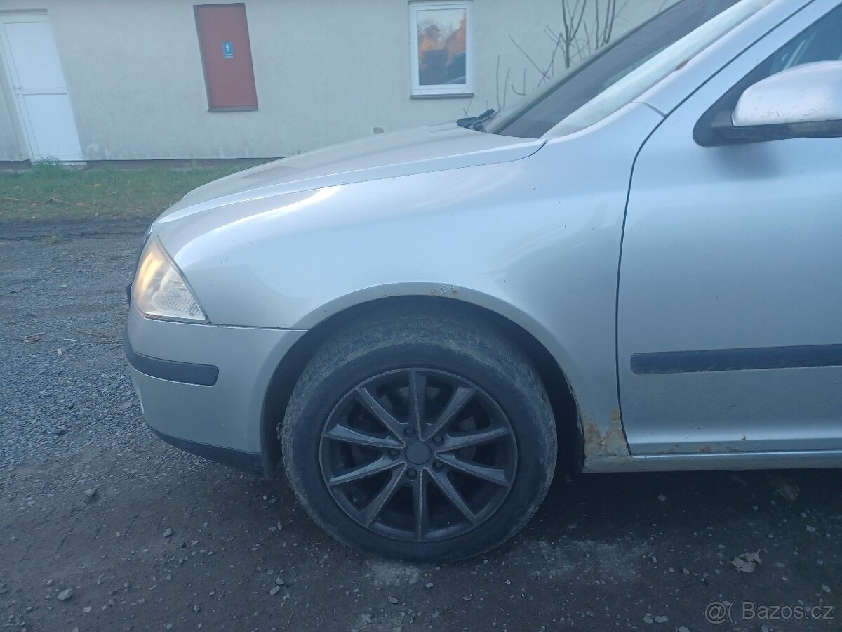 Škoda Octavia 2 kombi 1.9 tdi BLS r. 2008 - 8