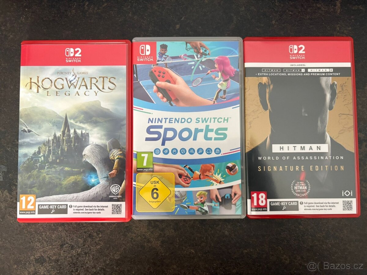 Nintendo Switch 2 + 4 hry , obal - 8