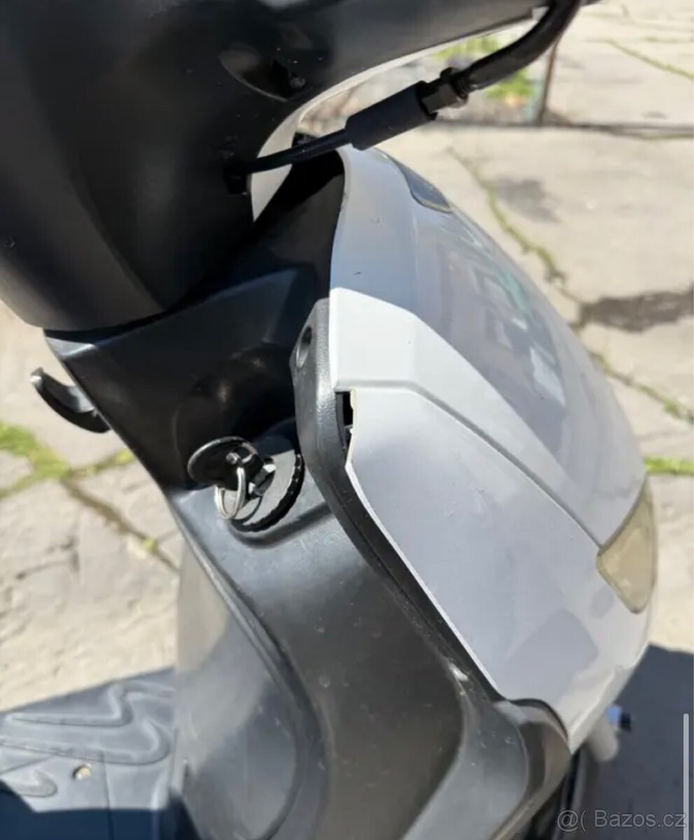 Peugeot Tweet 125 r. 2014 - 8