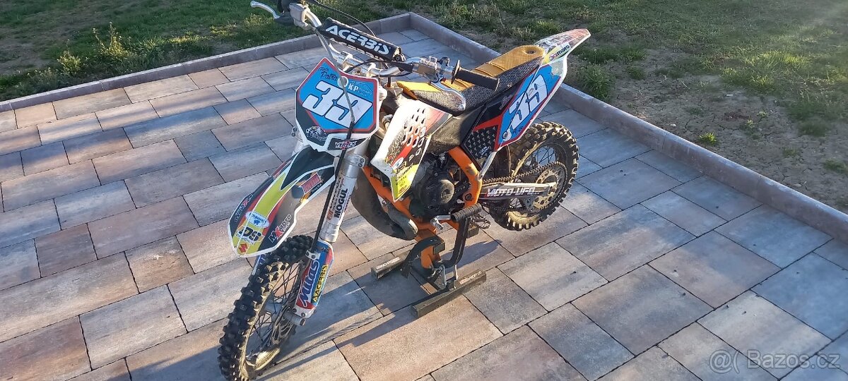 KTM 65 + náhradní díly + oblečení - 8
