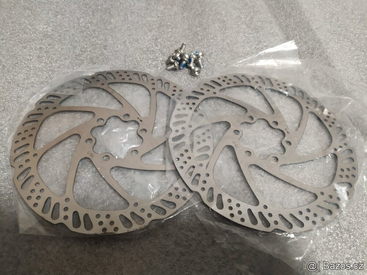 Spousta nových brzdových kotoučů 6 děr a CL. - 8