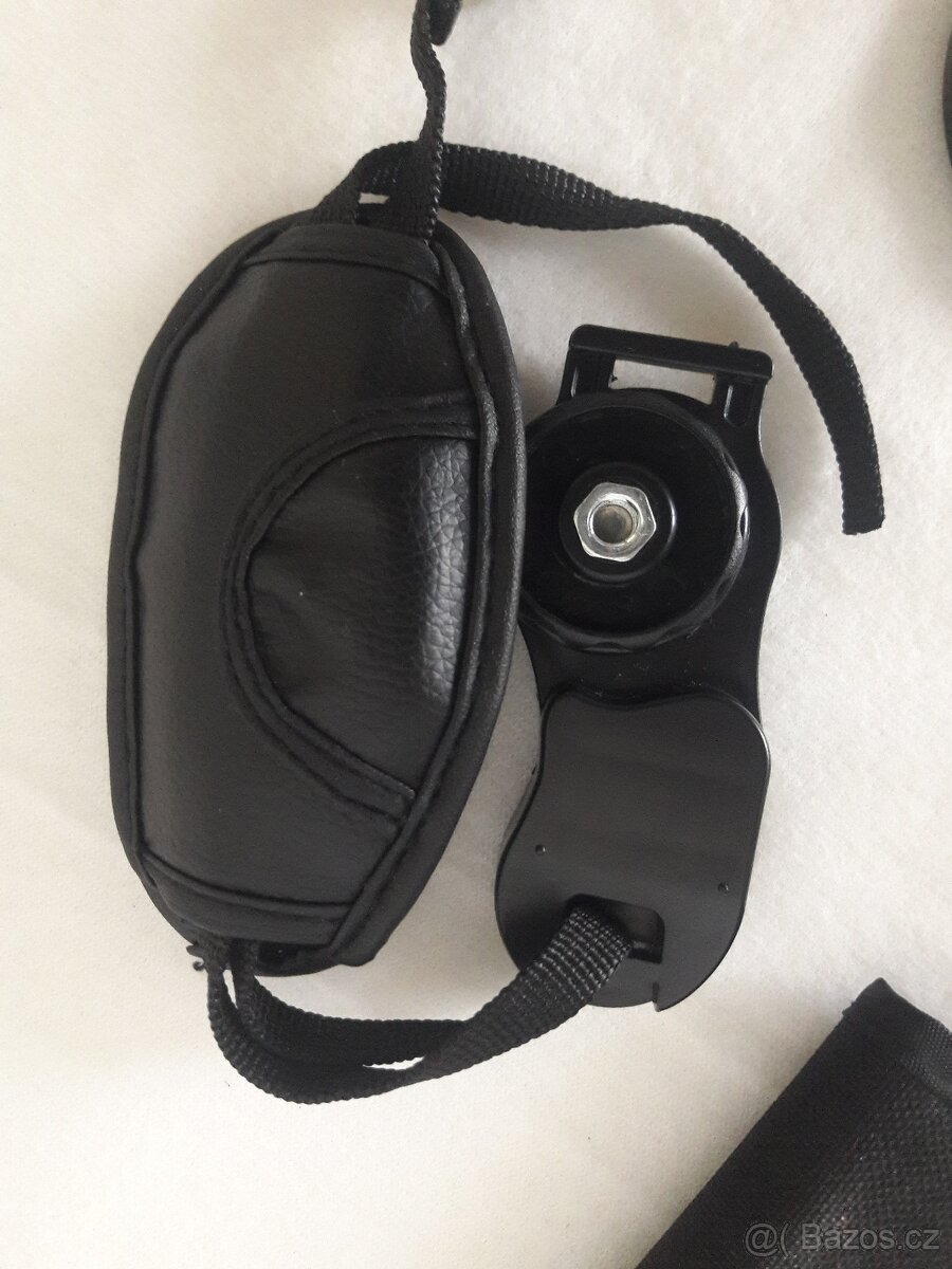 Krytka objektivu, popruh, clona, difuzer, očnice.. - 8