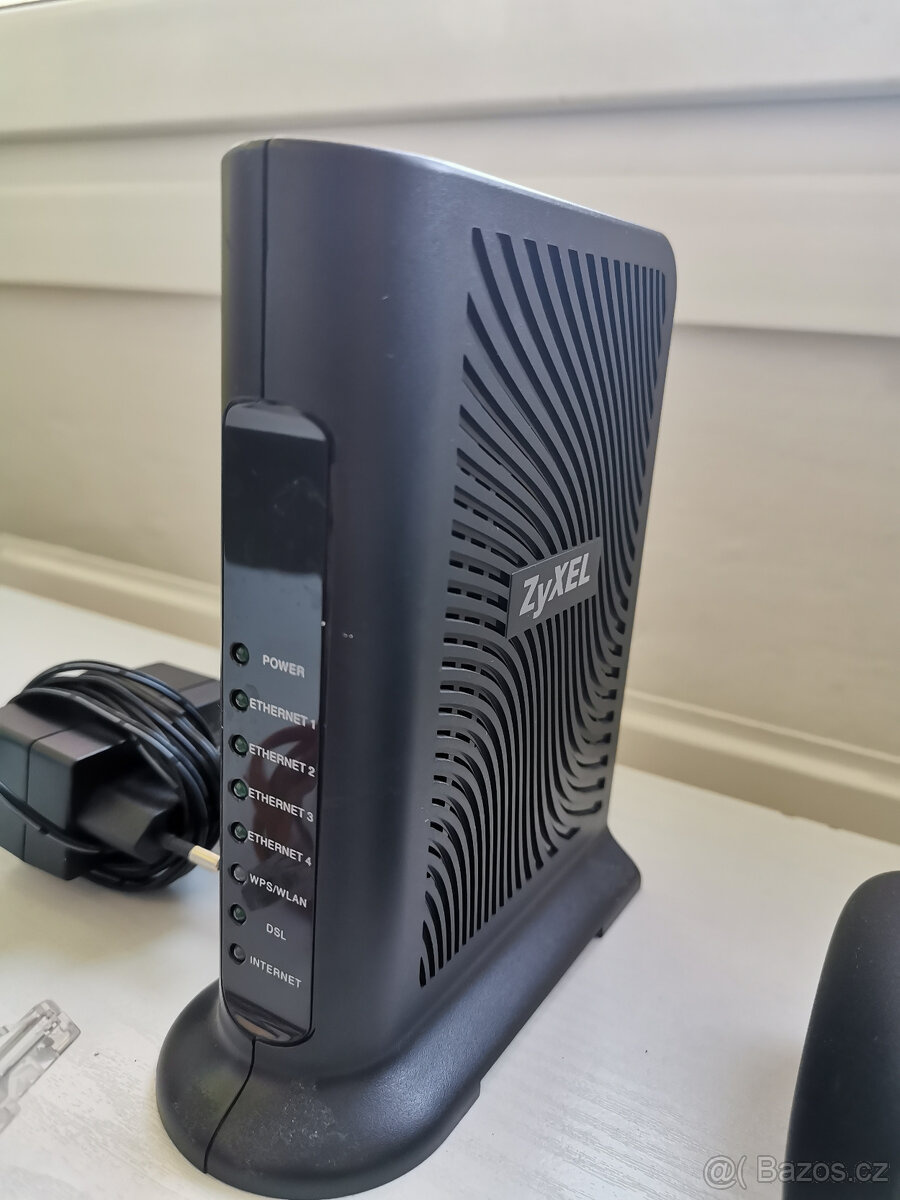 Prodám bezdrátové telefony + routr - 8