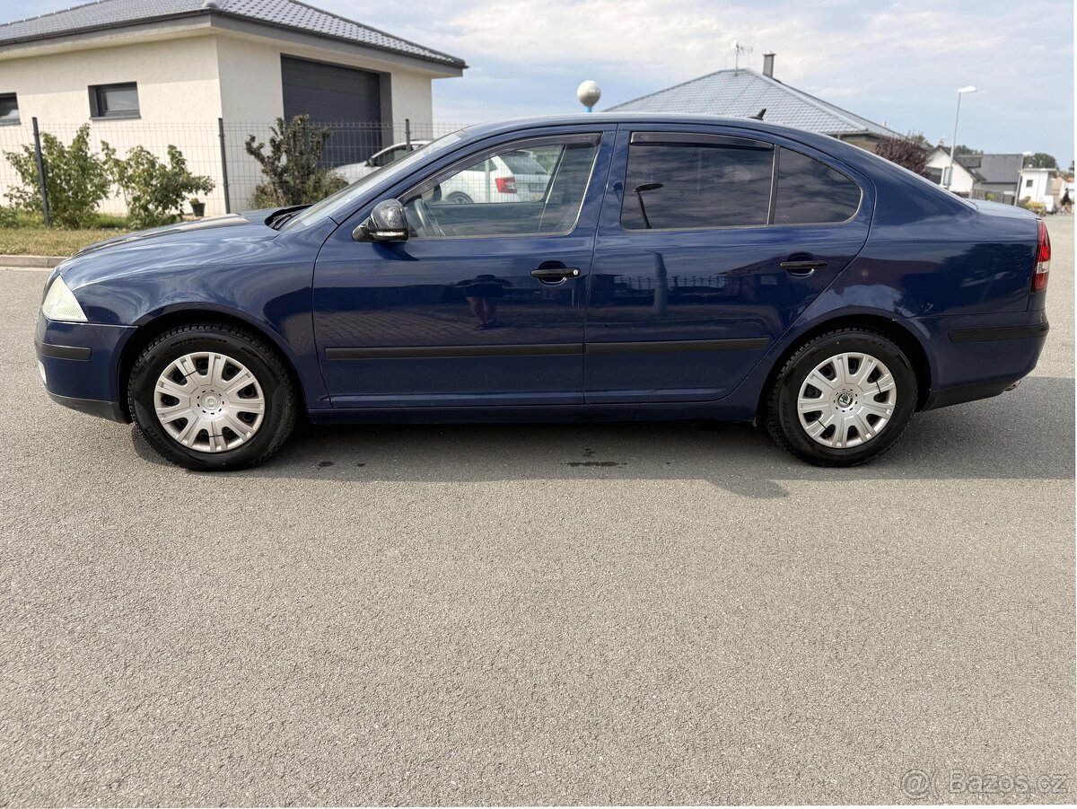 Škoda Octavia II 1.6 75kW rok 2011 - 8
