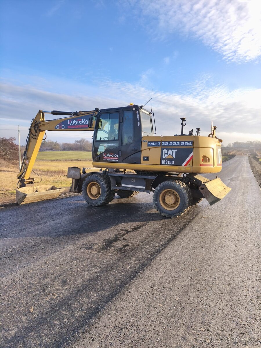 Kolový bagr Cat 315D - 8