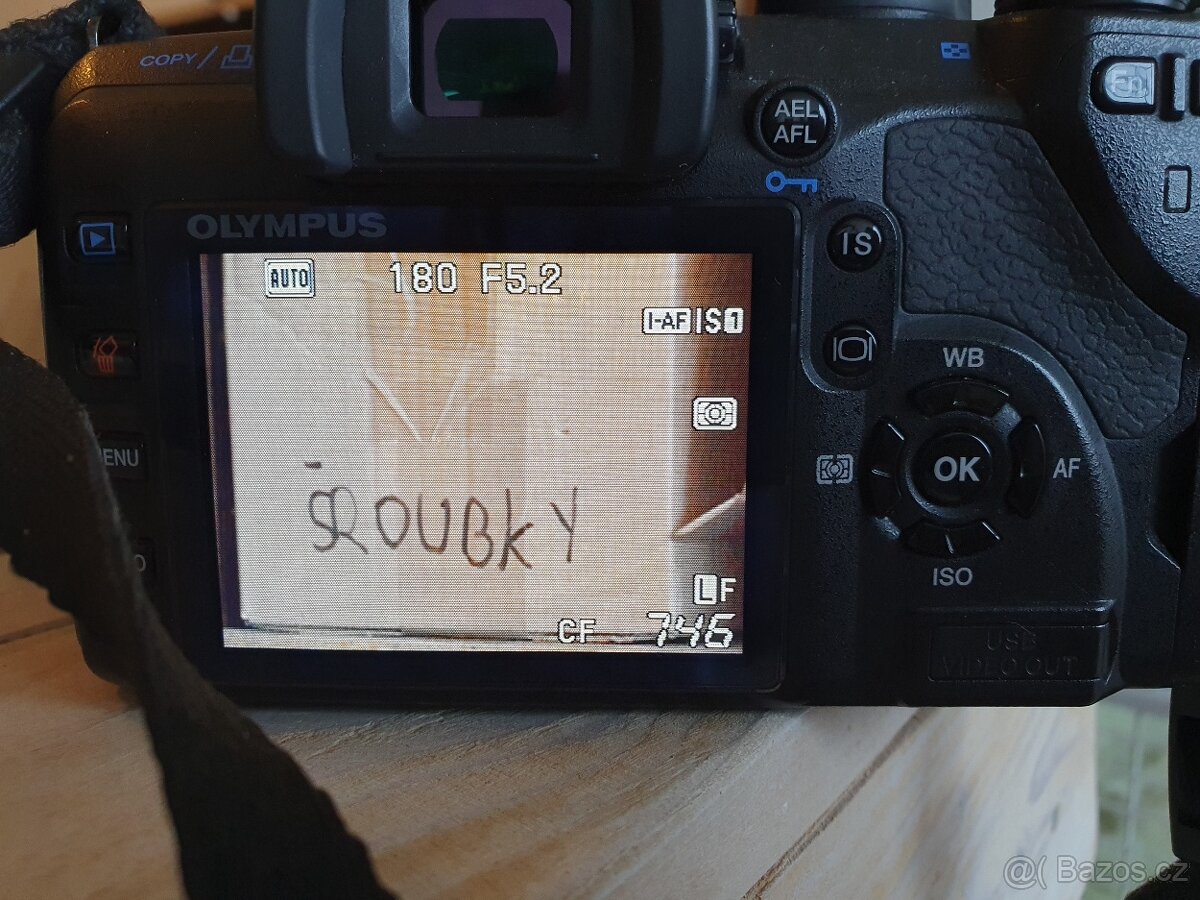 Olympus E-520, dva objektivy, dvě baterie, batoh, karty. - 8