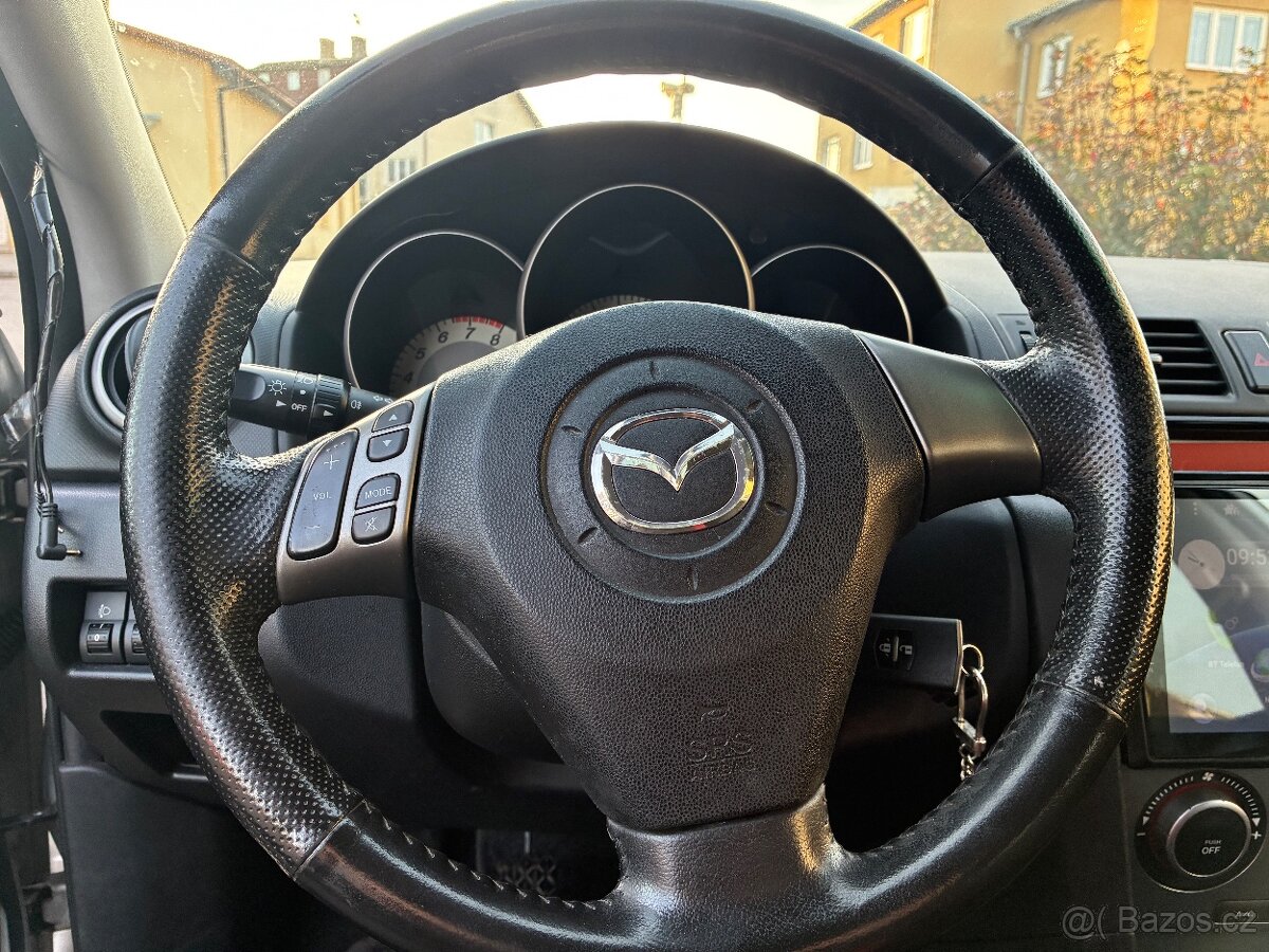 Mazda 3 1.4i 62kw rv. 2008 serviska pěkný stav - 8