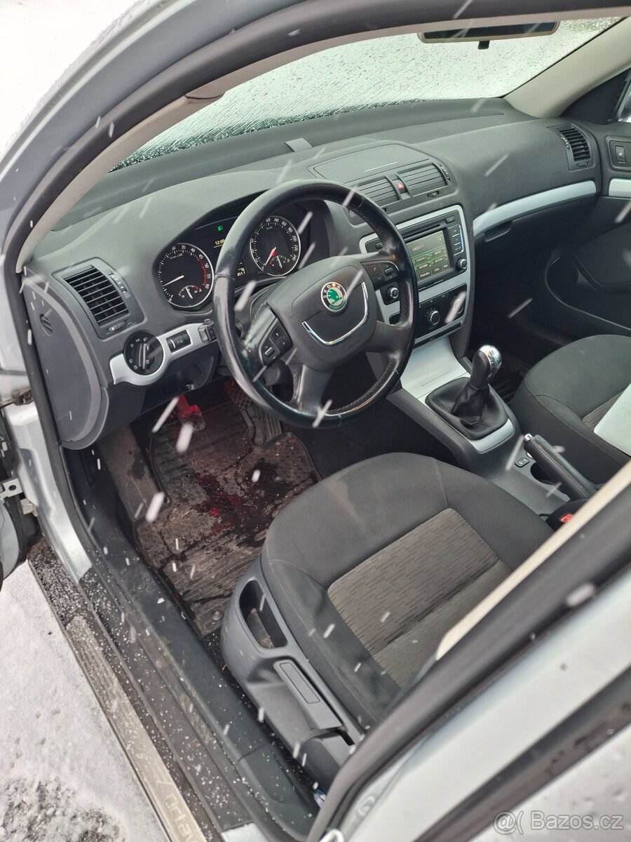 Škoda octavia 1.6 Tdi 77Kw - 8