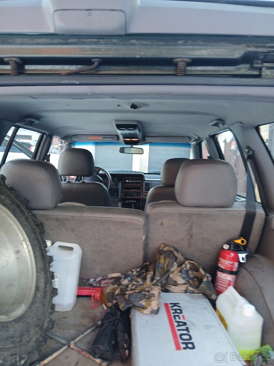 Prodam jeep grand cherokee 5.2i - 8