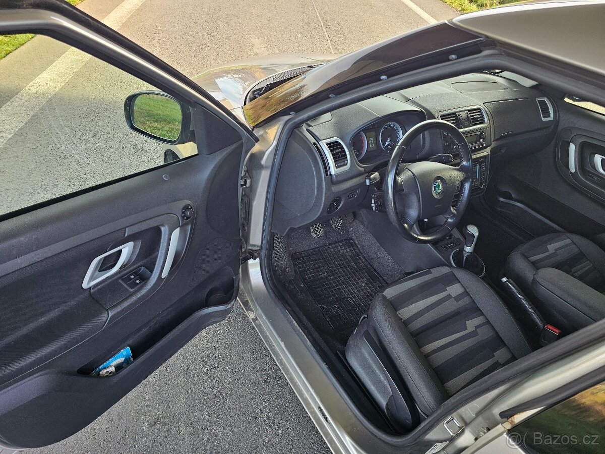 Skoda roomster 1.4 i 63kw - 8