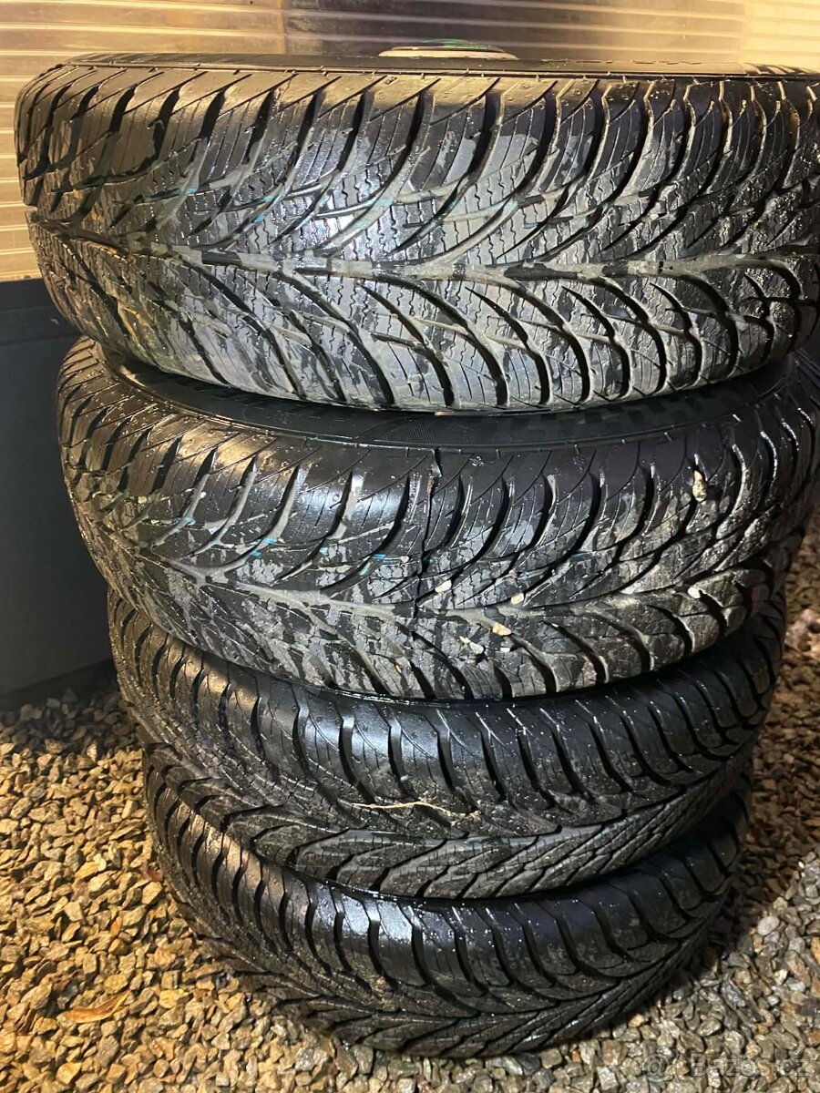 165/70 R13 Felicia - 8