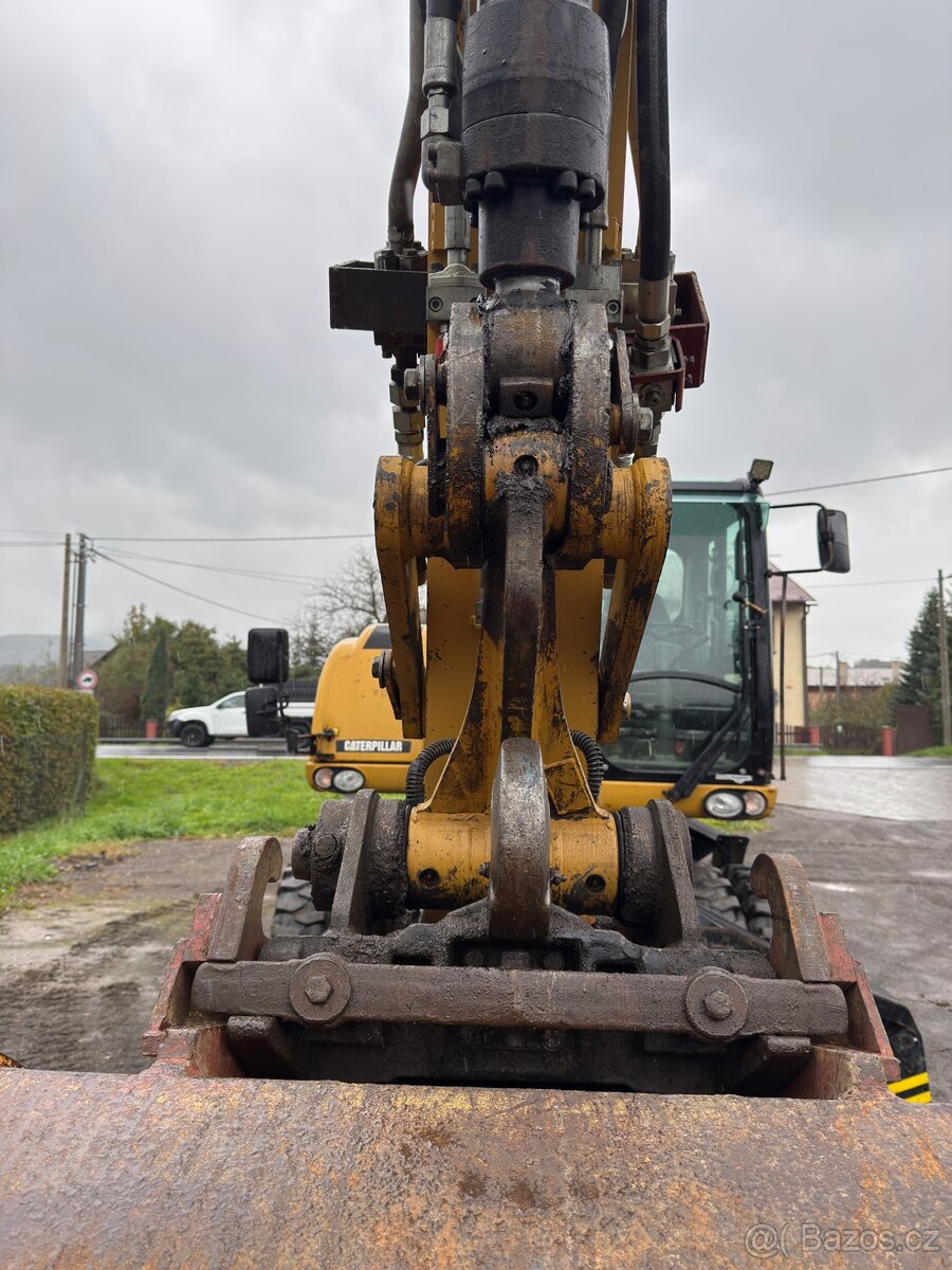 Kolový rypadlo Caterpillar M316D - 8