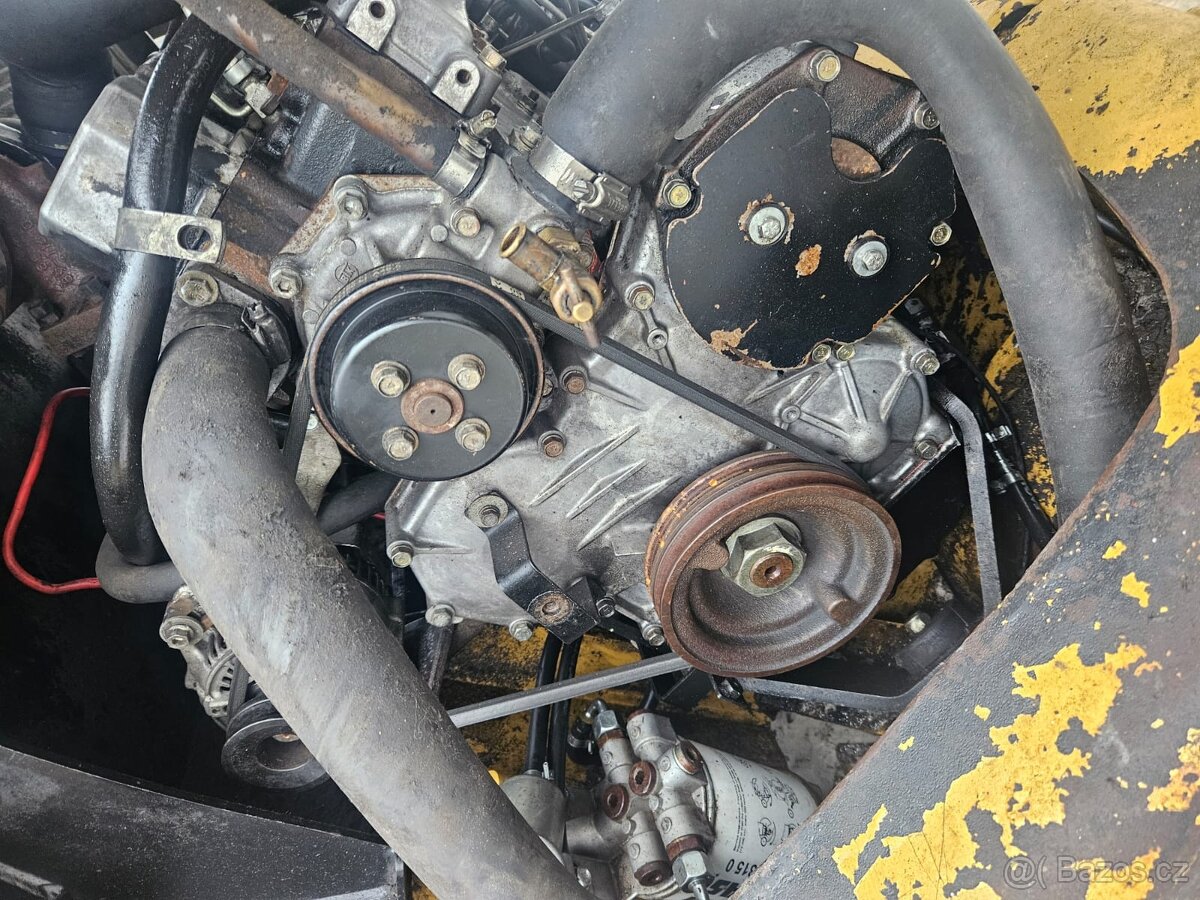 Díly na Cat 906 r.2006 - 8