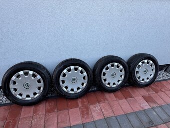 Zimní kompletní sada na Octavii 5x100 - 8