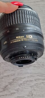 Nikon DX SWM VR Aspherical 28m/0.92ft průměr 52 - 8