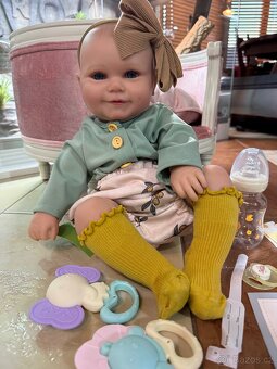 REALISTICKÁ PANENKA S ČELENKOU N.O.V.Á. - 8