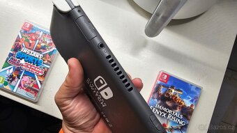 Nintendo Switch Lite + 2hry - 8