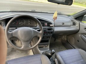 Mazda 323 - 8