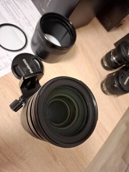 Olympus / System OM-1 + - 8