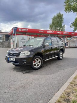 Mazda tribute 2.3 i    4×4 - 8