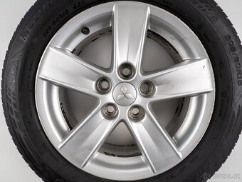 Mitsubishi Lancer - Originání 16" alu kola - Celoroční pneu - 8