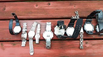 Stare zapalovače ,nůžky ,hodinky ,autíčka . - 8