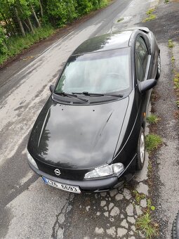 Tigra 1.4 16v r.v. 2000 - 8