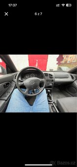 Mazda 323f - 8